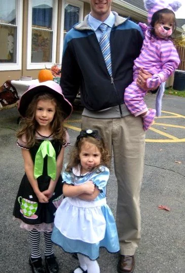 Store bought Alice in Wonderland family Halloween costumes for the win!