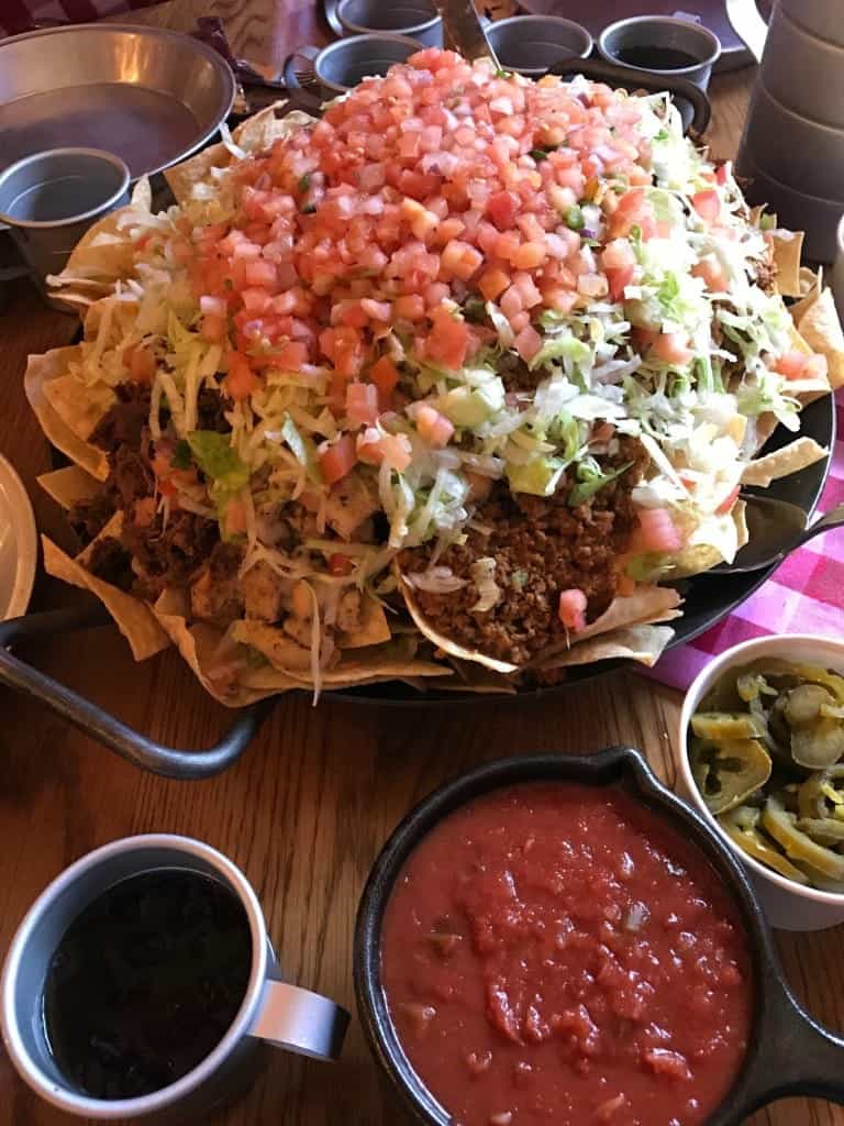 You can request toppings on the side when you order the Nachos Rio Grande at Pecos Bill!