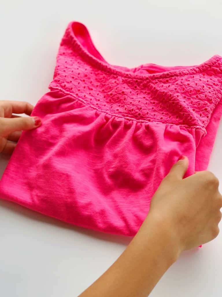 Teach your kids how to do laundry by letting them fold and have fun with it!