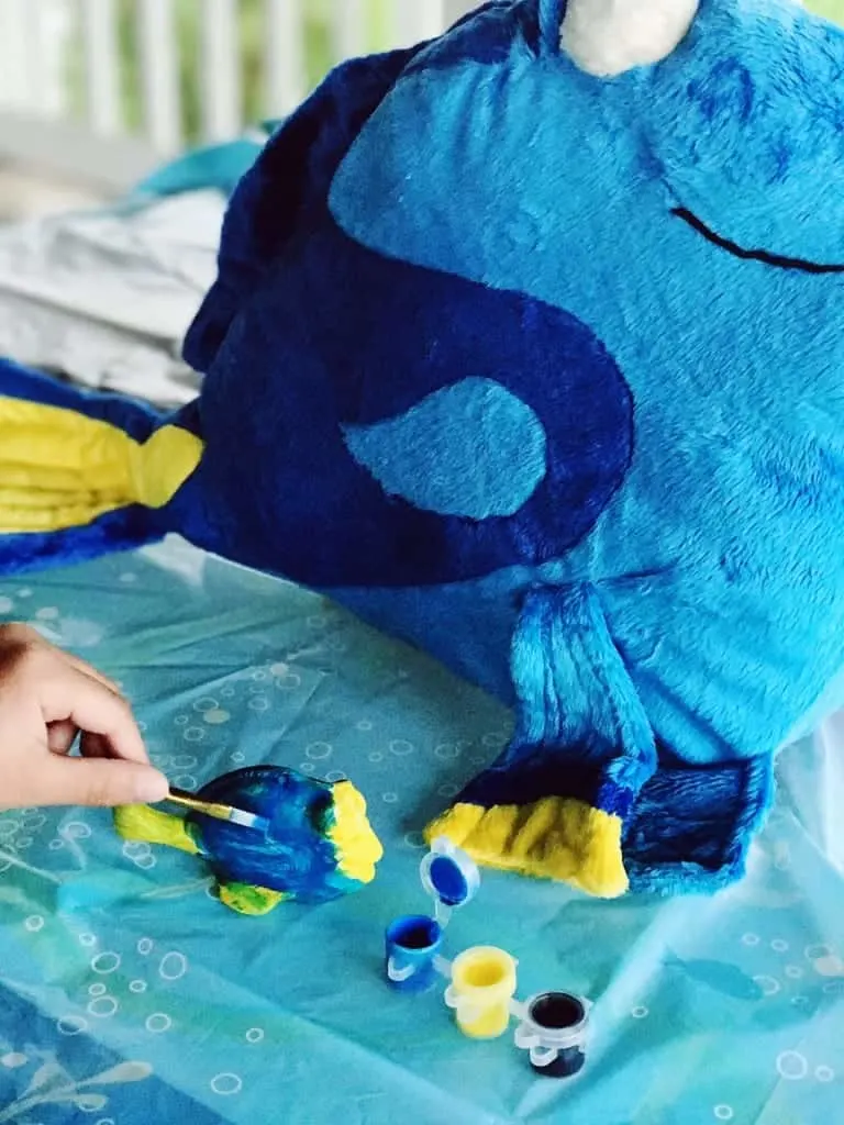Kids love to paint, so we had a Finding Dory Painting Station