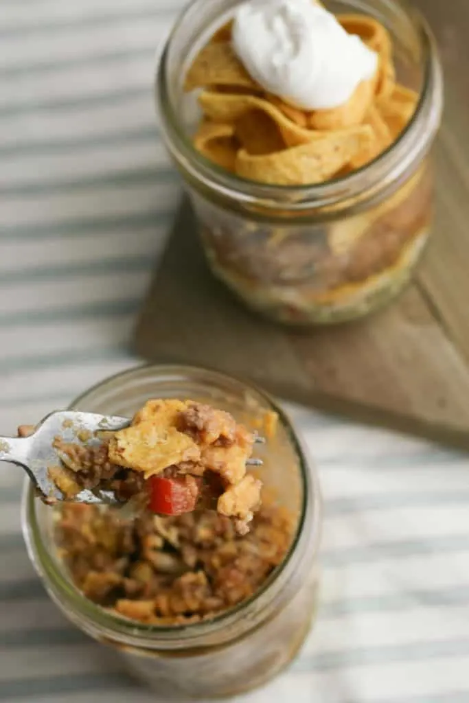 Make this easy Fritos Pie in a jar for guests!