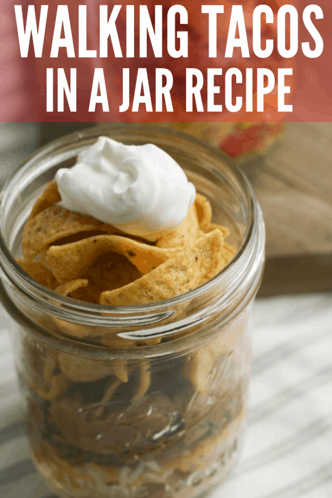 Try this easy Walking Taco in a jar! It's a cross between Frito Pie and Walking Tacos. This quick family dinner recipe takes less than 30 minutes to make and is great for parties, too!