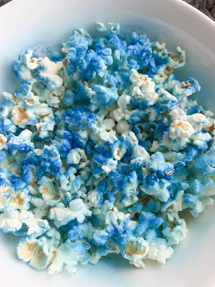 Spray Descendants 3 popcorn with Wilton food spray.